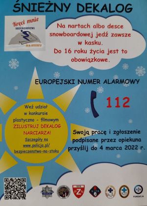 na obrazku znajduje się plakat z numerem alarmowym, informacją o konkursie i zasadami bezpieczeństwa na stoku